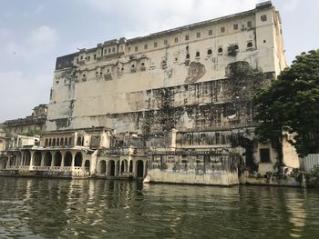 View of old building by river