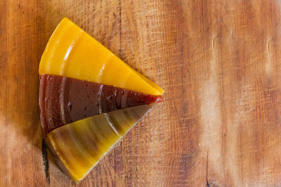 Directly above shot of yellow bread on cutting board