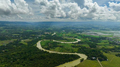 Houses of farmers among farmland and agricultural land. negros, philippines