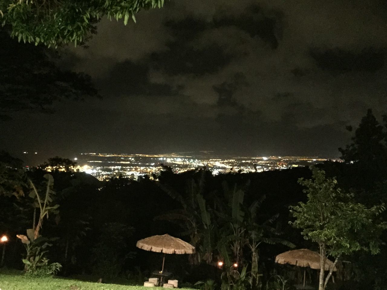 illuminated, night, sky, building exterior, built structure, cityscape, city, tree, architecture, cloud - sky, residential building, high angle view, residential district, outdoors, residential structure, cloudy, crowded, landscape, no people, nature