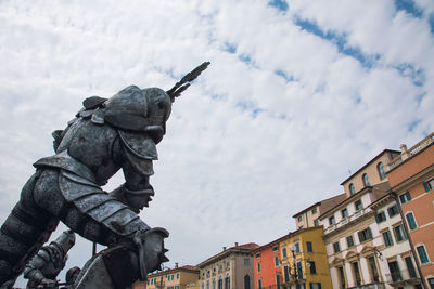 Low angle view of statue against sky in verona