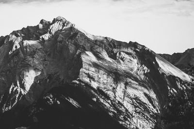 Low angle view of rock formation against sky