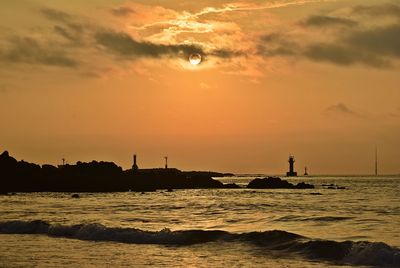 Scenic view of sea against sky during sunset