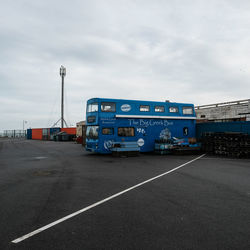 Cars on road against sky