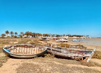 Panoramic view of beach against clear blue sky