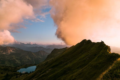 Scenic view of mountains against sky during sunset