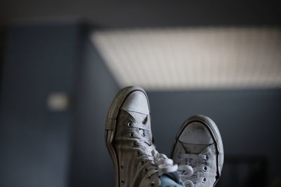 Low section of man sitting indoors