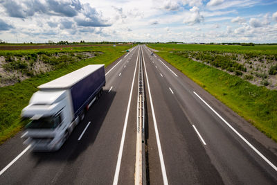 Motion blurred truck on the highway