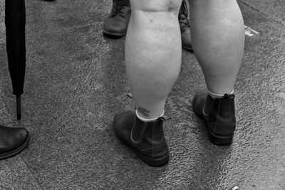 Low section of woman in high heels