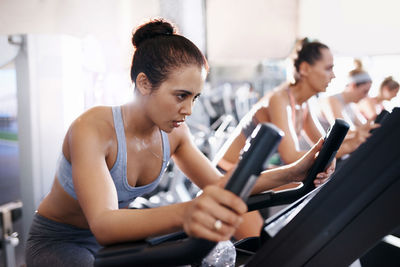 Females exercising at gym