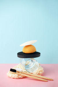 High angle view of cake on table against blue background