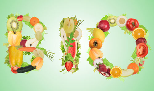 Various fruits against white background