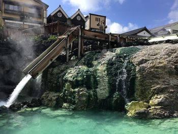 View of water flowing through rocks