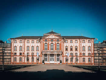 Facade of building against blue sky