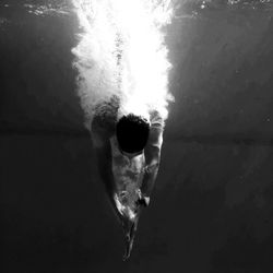 Portrait of woman swimming in sea