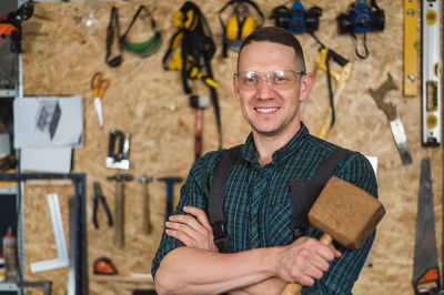 Portrait of man holding key