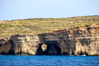 Scenic view of sea against clear sky