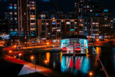 Illuminated buildings in city at night