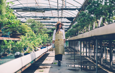 Woman standing on bridge