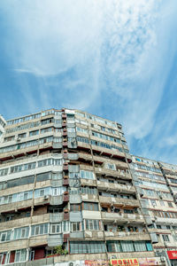 Low angle view of modern building against sky