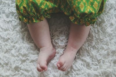 Low section of child standing on floor