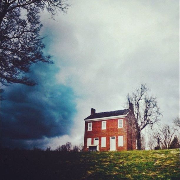 building exterior, architecture, built structure, sky, house, tree, cloud - sky, bare tree, residential structure, cloudy, residential building, overcast, window, cloud, field, low angle view, outdoors, day, weather, nature