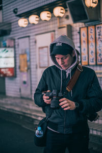 Full length of man photographing