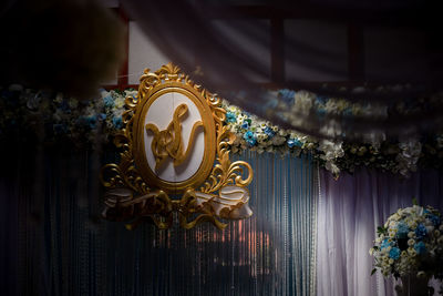 Low angle view of decoration on ceiling