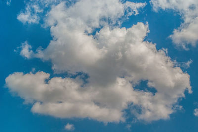 Low angle view of clouds in blue sky