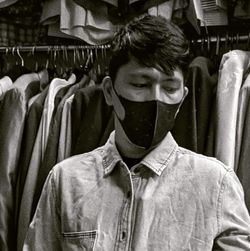 Portrait of man wearing hat at store