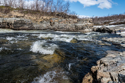 Scenic view of river against sky