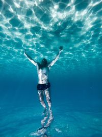 Man swimming in sea