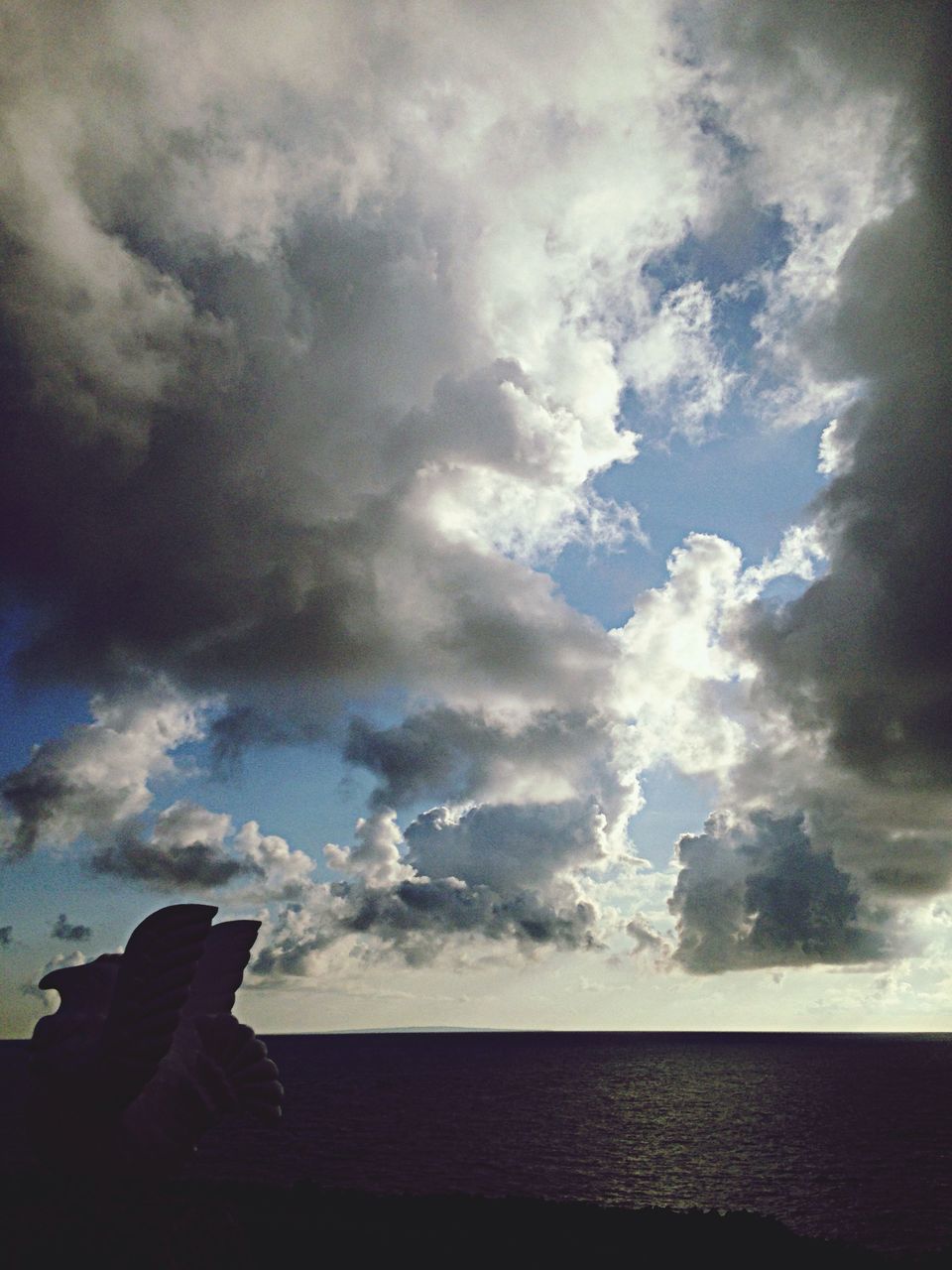 sky, sea, horizon over water, water, cloud - sky, scenics, beauty in nature, tranquil scene, cloudy, tranquility, nature, cloud, idyllic, beach, weather, blue, outdoors, overcast, day, no people