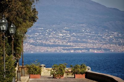 Scenic view of sea against the city of naples