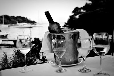 High angle view of wine glasses on table at restaurant