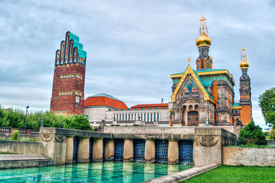 View of historical building against cloudy sky