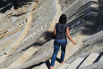 Rear view of woman walking