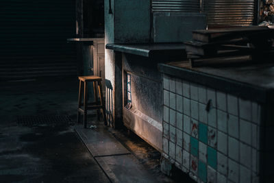 Empty chairs in abandoned building