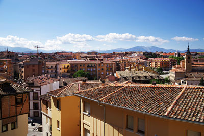 Aerial view of townscape against sky