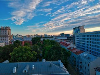 High angle view of buildings in city against sky