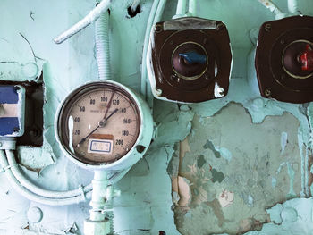 Close-up of electrical equipment on wall