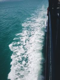 High angle view of surf on sea