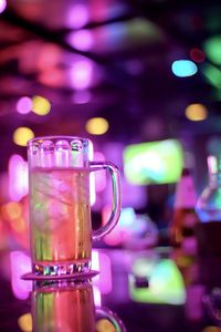 Close-up of beer glass on table