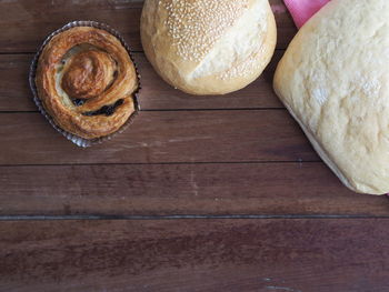 High angle view of bread on cutting board