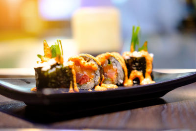 Close-up of fish served in plate on table