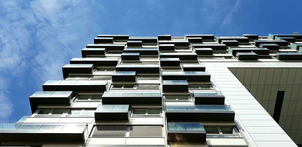 Low angle view of modern building against sky