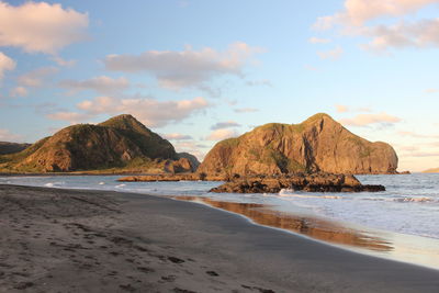 Scenic view of beach against sky