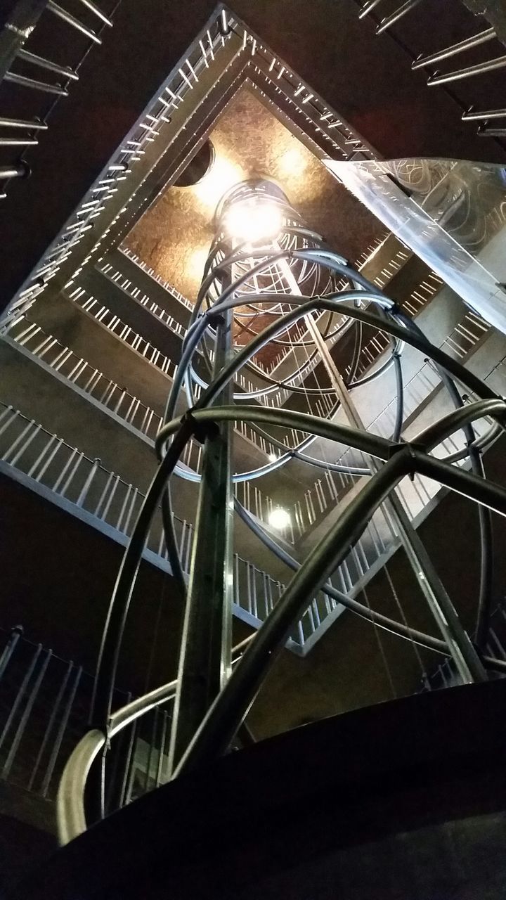 LOW ANGLE VIEW OF ILLUMINATED STAIRCASES