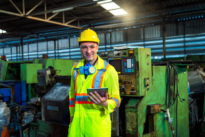 Man working with mobile phone in office