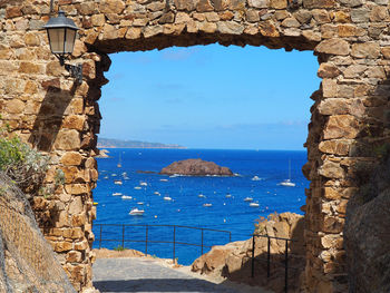 Scenic view of sea against blue sky
